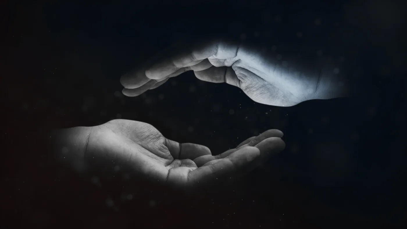 Artisan hands weaving traditional silk fabric